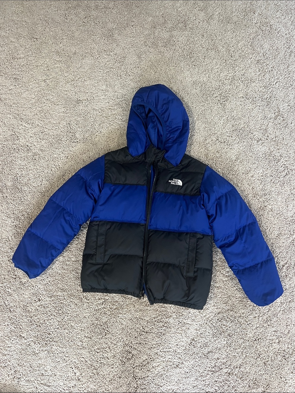 The North Face Kids Blue and Black Hooded Puffer Jacket REVERSIBLE